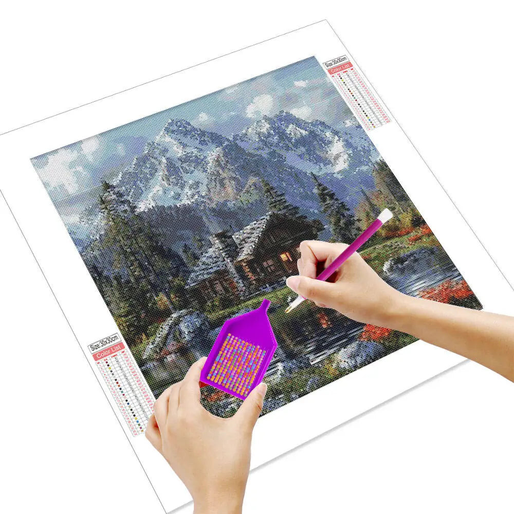 Río entre montañas representado en un mosaico de diamantes